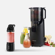 The Fridja Portable Blender/Juicer Duo - f500 and f2500 are displayed on a white background, surrounded by bottles of juice, a glass of juice, fresh fruit, and ice cream.