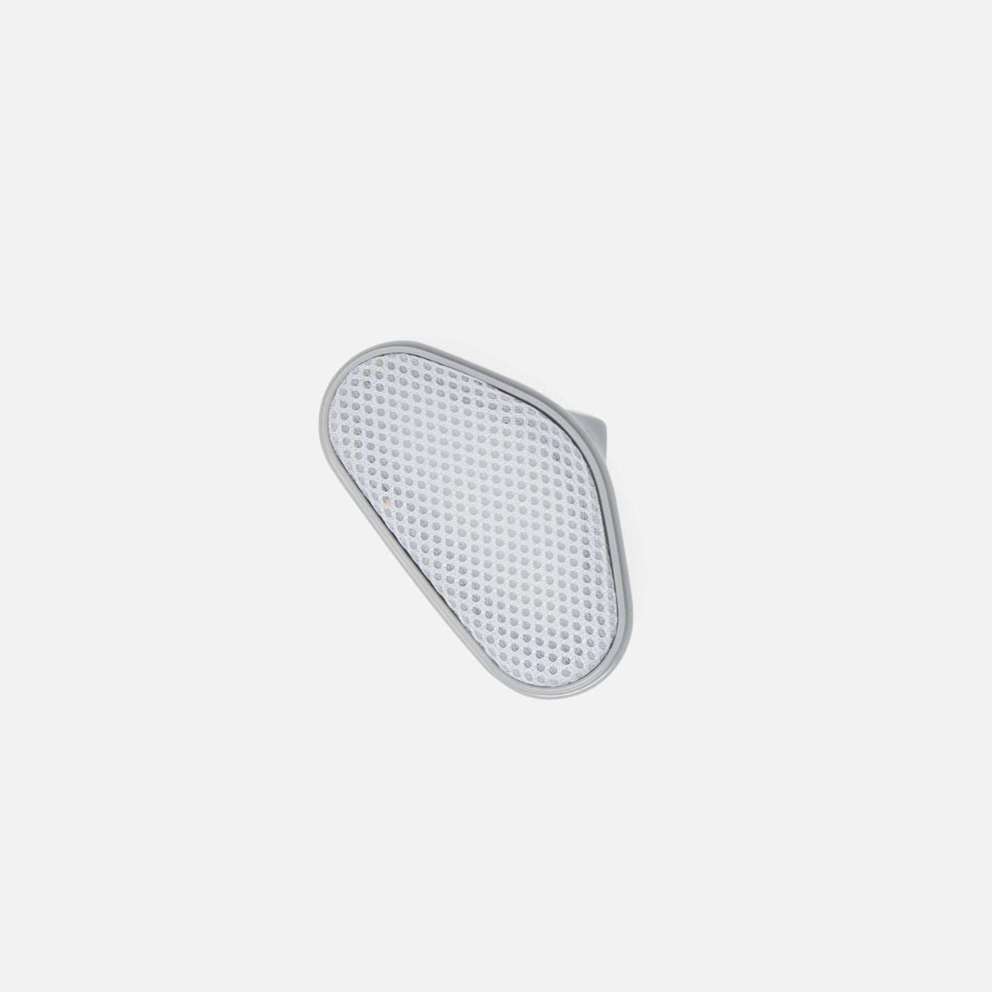 The Fridja f10 Fabric Net Guard is a white, oval accessory with a textured surface and slight rim, designed to protect delicate fabrics. Displayed on a plain light background.