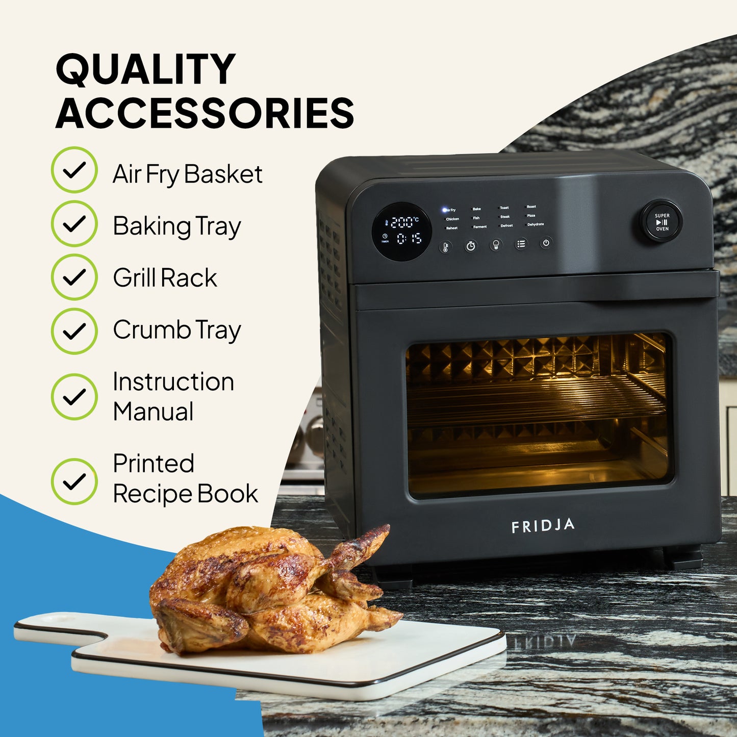 A black Fridja Super Oven 15L Digital Air Fryer Oven with 12 smart presets is on the kitchen counter. A roasted chicken sits on a cutting board. Included: air fry basket, baking tray, grill rack, crumb tray, manual, recipe book.
