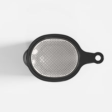 The Fridja f2500 Pulp Sieve Filter is a metal juice strainer with a black handle and fine mesh, shown from above on a white background. Its handle includes a hole for convenient hanging, making it an ideal juicing accessory.