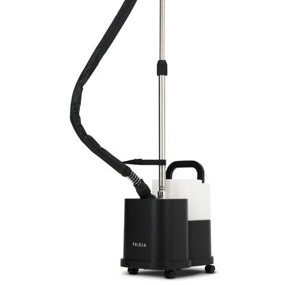 The Fridja f1600 Commercial Clothes Steamer features a black and white design, flexible hose, retractable pole, wheeled water tank, and the Fridja logo on the front—ideal for professional garment care in any setting.