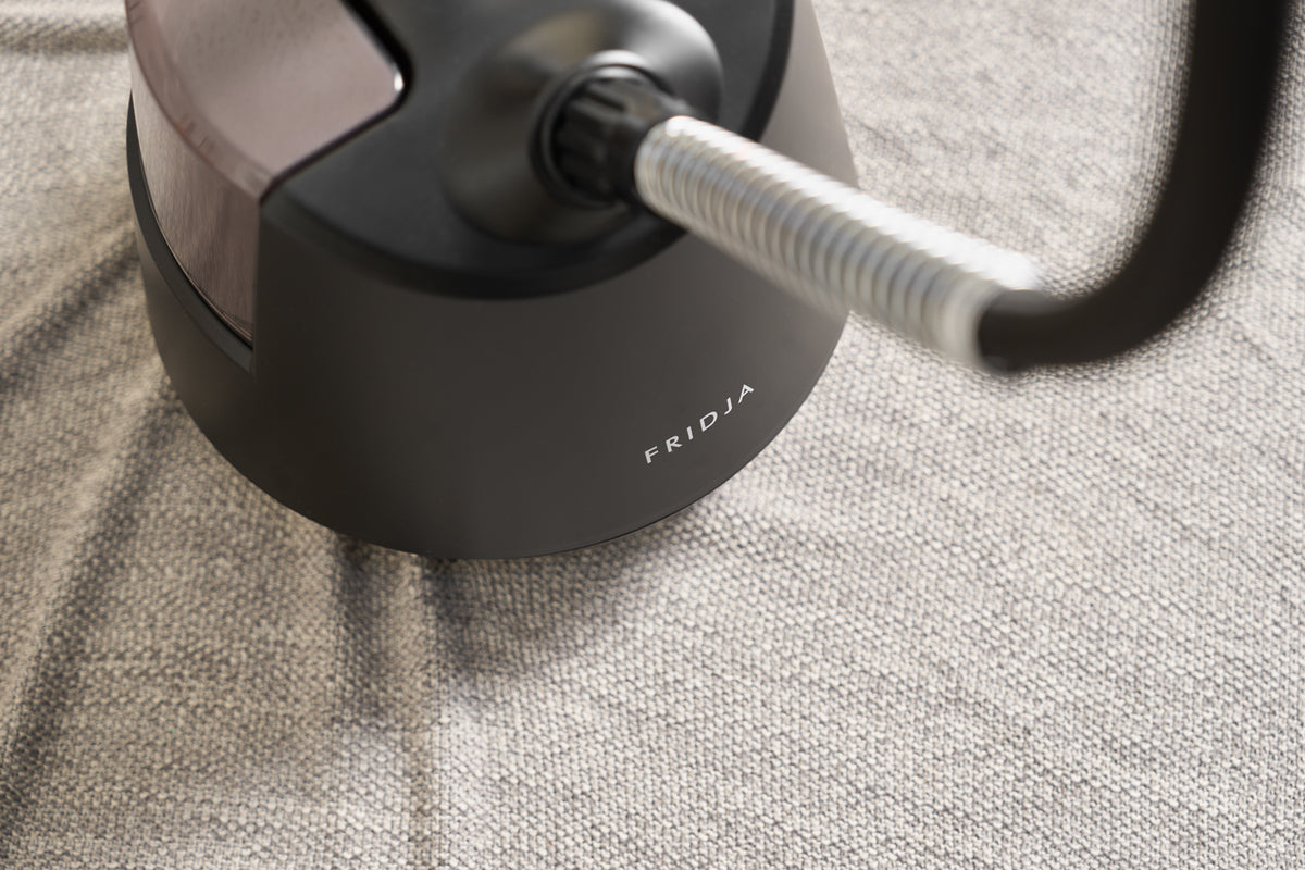 Close-up of the sturdy Fridja f1200 base and steam hose