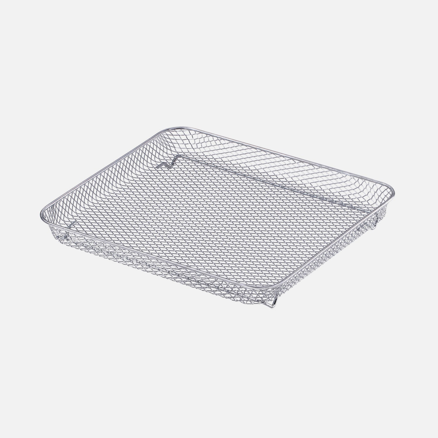 The Fridja f77 Air Fryer Basket is a rectangular, shallow silver metal mesh accessory with raised edges, designed for use with the f77 Super Oven or air fryer. The basket is shown on a white background.