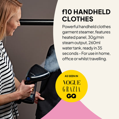 A woman steams a black jacket using the Fridja f10 Handheld Clothes Steamer; text highlights its features, including rapid heat-up, powerful steam output, and versatility as both a garment steamer and fabric refresher—making it the perfect choice for home or travel.