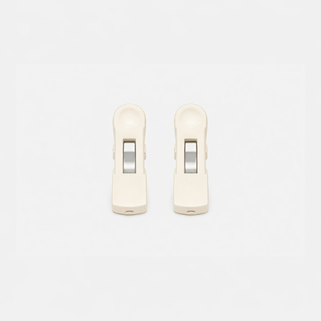 Two beige Fridja f1200 Clips with metal rollers, made as replacement parts for the Clothes Steamer Pro, are shown side by side on a plain white background.