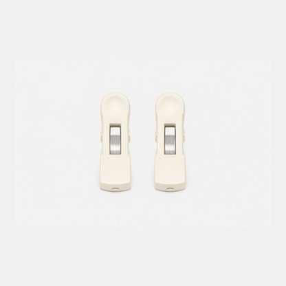 Two beige Fridja f1200 Clips with metal rollers, made as replacement parts for the Clothes Steamer Pro, are shown side by side on a plain white background.