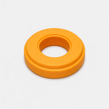 The Fridja f1900 Seal Ring is a solid orange plastic ring with a round center hole, shown on a plain white background.