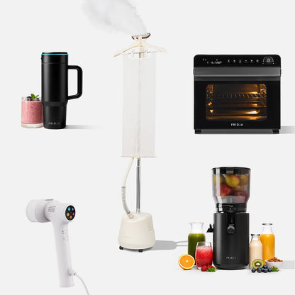 Five Fridja Full Range Deluxe appliances on a white background: the f600 Stainless Steel Portable Blender, the f1200 Clothes Steamer Pro, the f77 Super Oven Pro countertop oven, the f20 Handheld Clothes Steamer Pro, and the f2800 Open Whole Fruit Juicer with colourful drinks beside it.