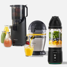 Fridja's Kitchen Pro Trio—f500 Portable Blender, f900 Citrus Juicer, and f2500 Self-Feeding Juicer—are shown with fresh juices, fruits, and bottles on a white background.